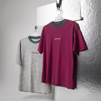 Two converse T-shirts photographed in a photo studio for Schuh's eCommerce website.