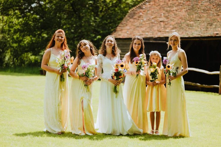 photo of the bride with her bridesmaids at the paper mill for her wedding