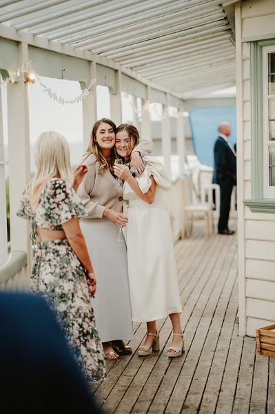 Wedding guest small together and pose for a photograph