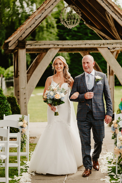 bride and her father walking down the aisle outdoor wedding at winters barns