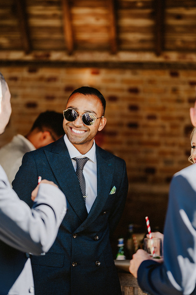 Wedding guest smiling naturally at the night yard