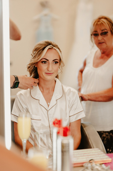 Bride having her hair done in the salon at Winters Barns