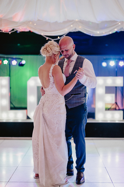 The first dance between the bride and groom indoors for their kent wedding reception at Marleybrook House