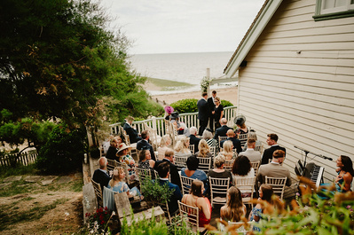 Wedding guests at Beacon house are seated for the ceremony