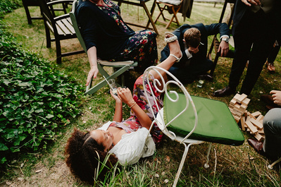 Wedding guest loses game of  Jenga and falls on the floor