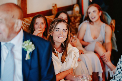 Bride looking emotional during hearing wedding speech
