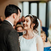 bride looks at her new husband lovingly during kent wedding ceremony