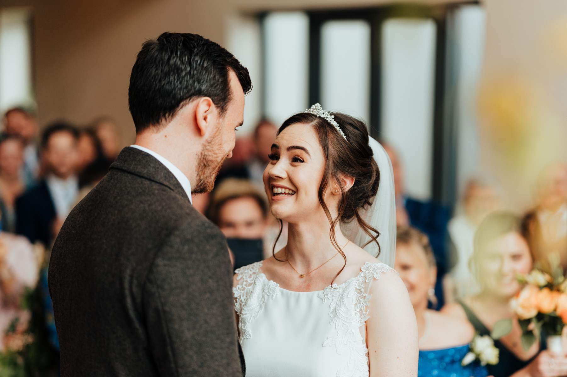 bride looks at her new husband lovingly during kent wedding ceremony