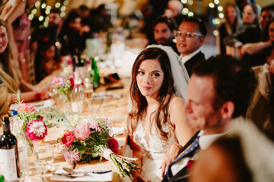 Hey Bride lovingly stares at her emotional groom during wedding speeches in Kent