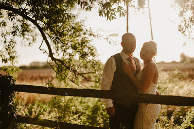golden hour Portraits of the bride and groom at Marleybrook House
