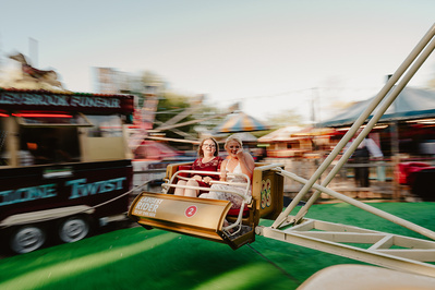 Gorgeous bride and her wedding guest on a fast ride at Marleybrook House