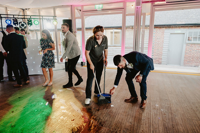 The night Yard staff cleaning up a drinks spillage on the dancefloor