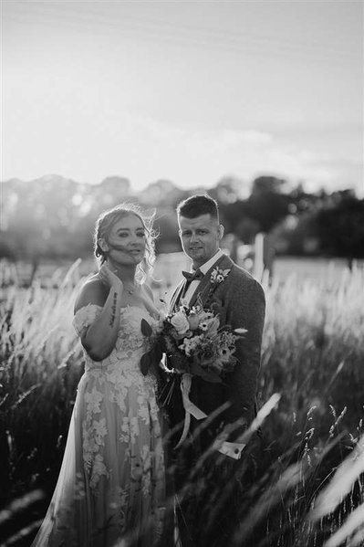 black and white photo of happy married couple on their wedding day at silchester farm
