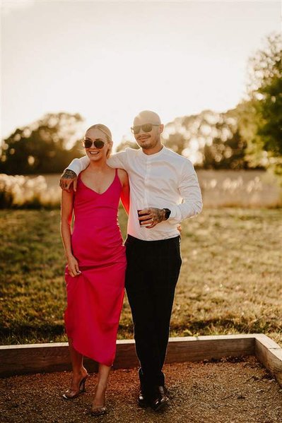 candid photo of wedding guests in warm golden hour light