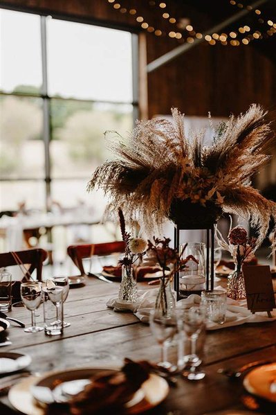 gorgeous dried florals on a rustic table set up at silchester farm