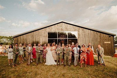 wedding guests ready for their champagne spray at silchester farm