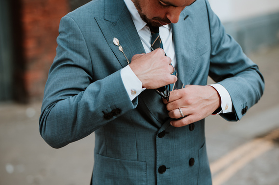 groom prep wedding photography