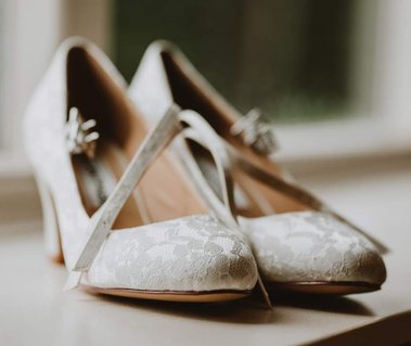 Wedding shoes on a window sill at the kent wedding venue Winters Barns in canterbury