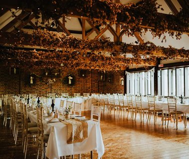 The Kent life wedding venue reception area with natural light coming through the window and stylish chairs