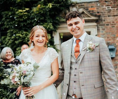 A amazing wedding confetti photo taken by Kent wedding photographer at the amazing Kent wedding venue The Vines
