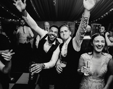 kent wedding photography photo in black and white photo of wedding guests partying at the cave hotel