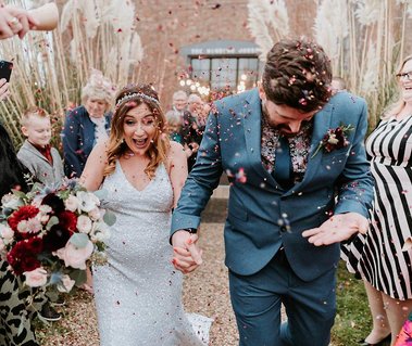 Great example of wedding photography in Kent is the must have confetti photo perfect to do at every wedding