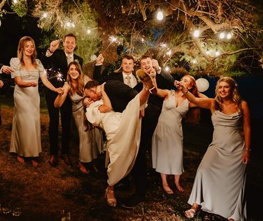 wedding sparkler portraits epic in low light under a tree