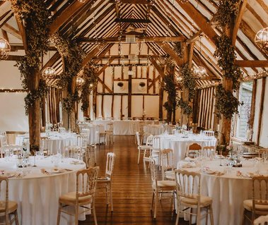 winters barns is one of the best wedding venues in kent and you can see why from this amazing wedding breakfast reception room