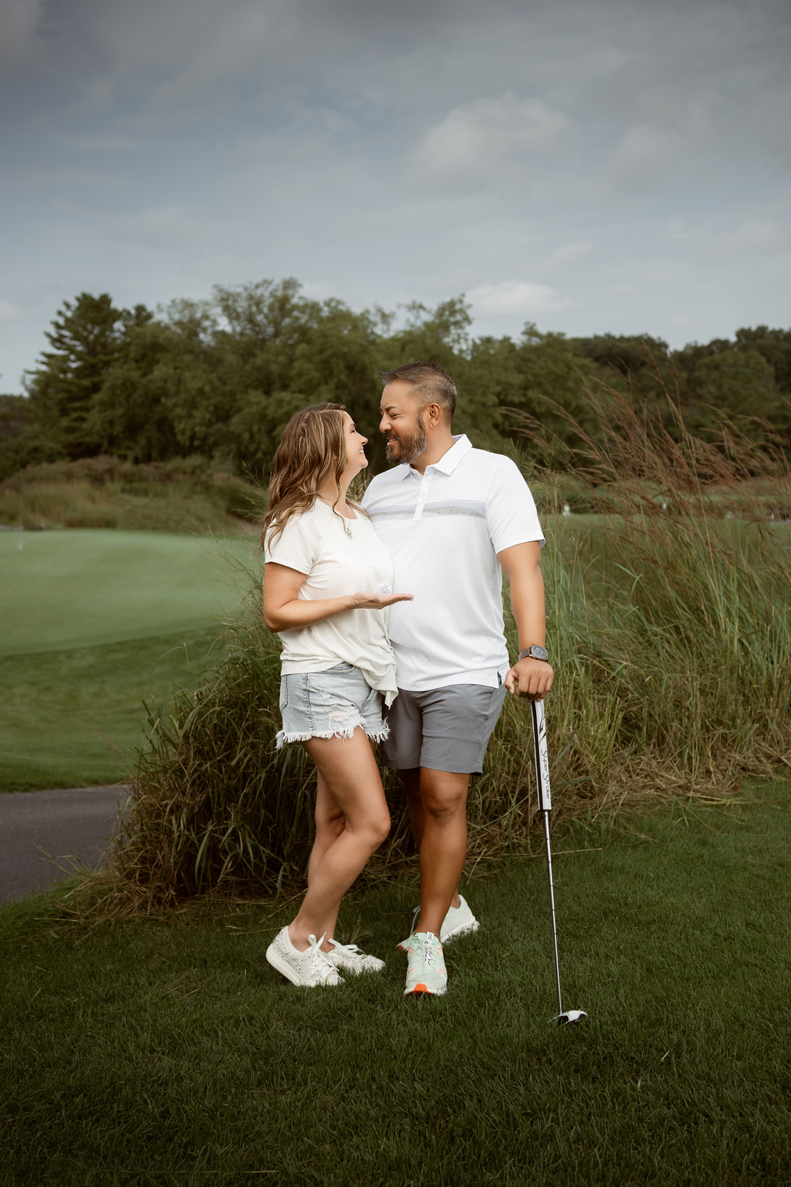 Golf club engagement photoshoot in Mequon Wisconsin. 
