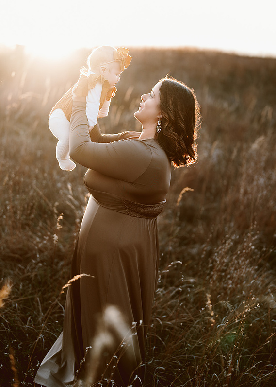Just mom and baby. A wonderful picture of a mom and baby girl in the outdoor setting. 