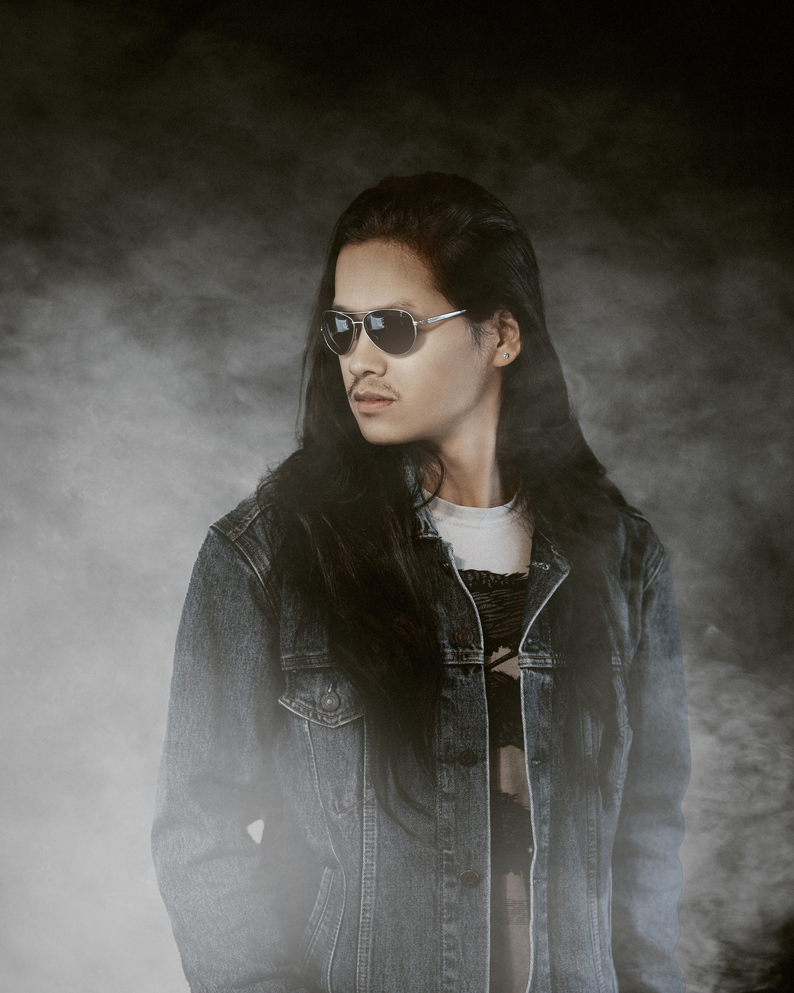 Stunning portrait of a young man in classic studio background. Great portrait photoshoot in Mequon and surrounding areas. 