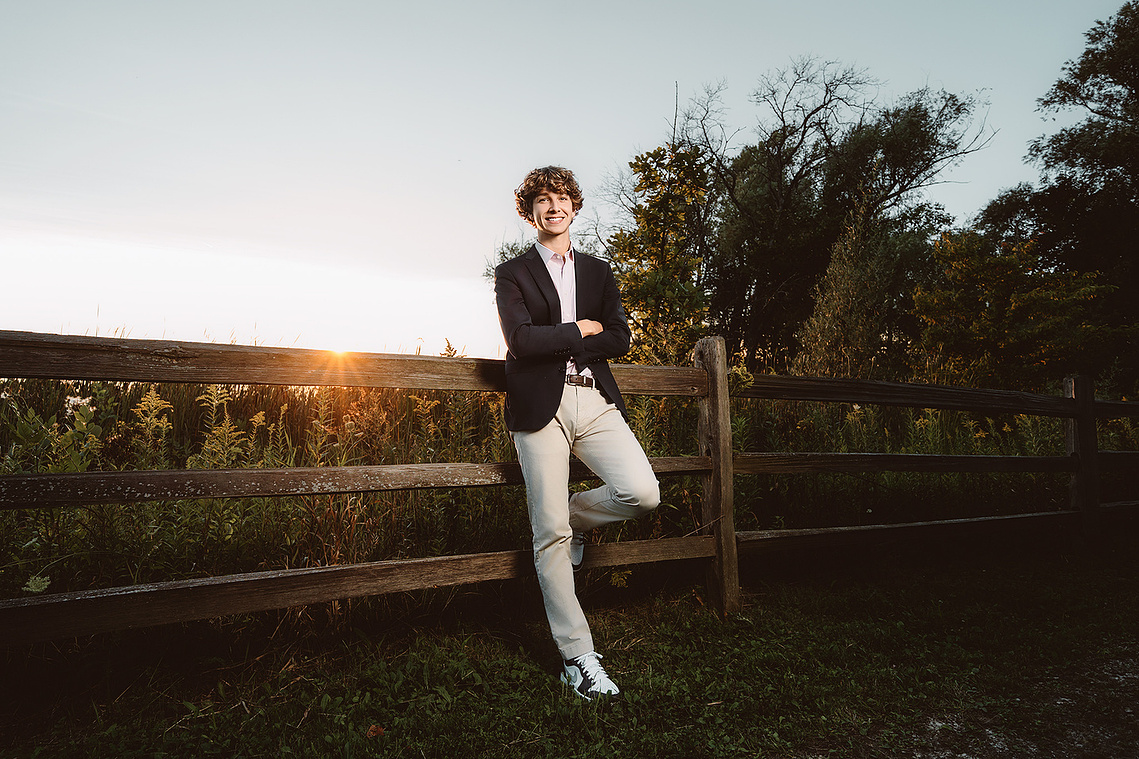 Stunning outdoor senior portrait of a young boy. Great sunset location in Mequon, Wisconsin. 