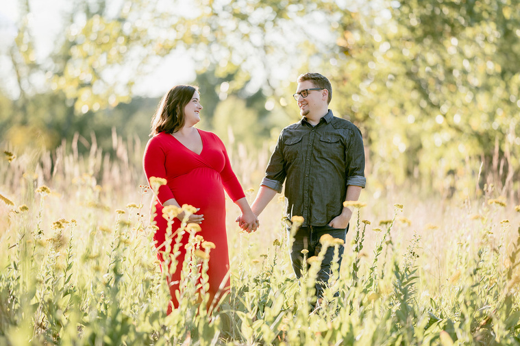 Stunning outdoor maternity photograph at Riveredge Nature Center Saukville Wisconsin. Beautiful golden light creating timeless maternity picture. 