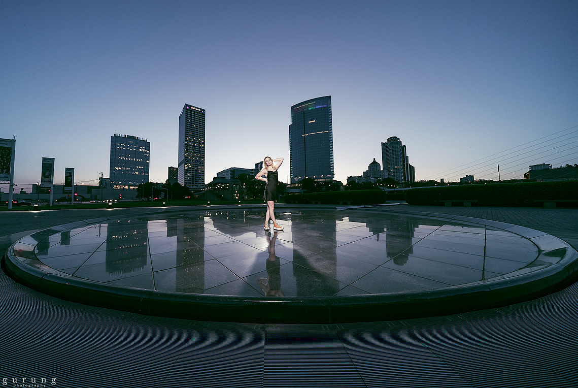 A young girl embracing her pose in the heat of Down Town Milwaukee in her photoshoot. Milwaukee Wisconsin portrait photography. 