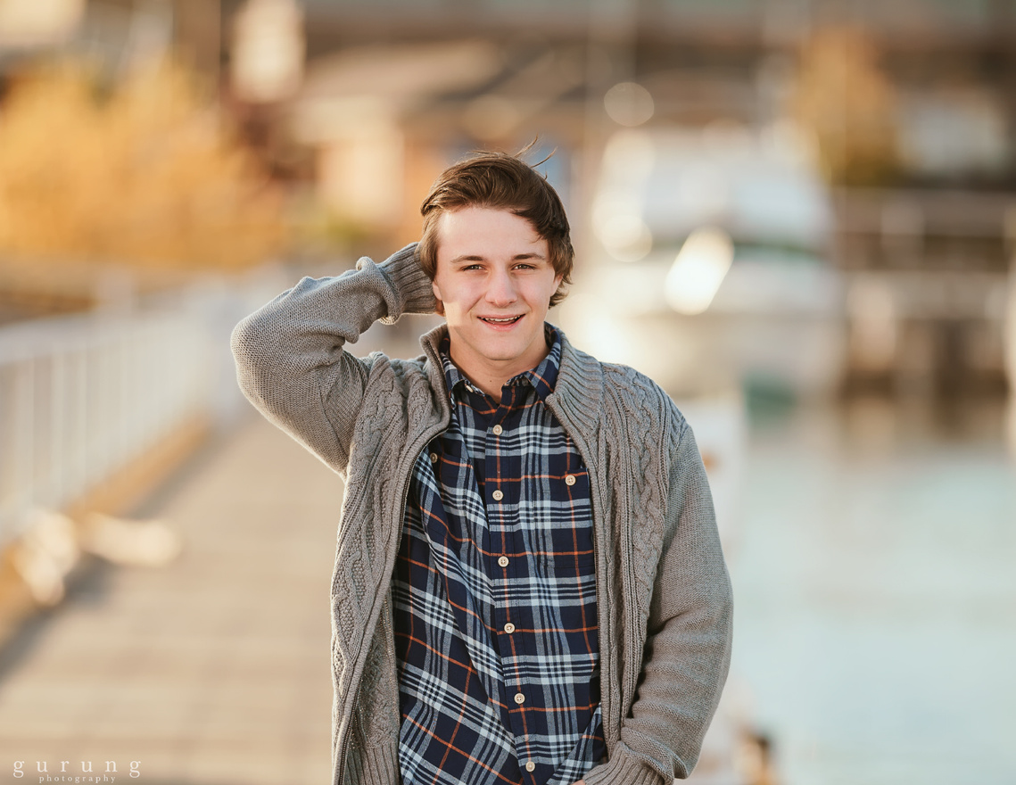 Magical senior portrait of a young high school boy in Mequon Wisconsin. Great golden sunlight.