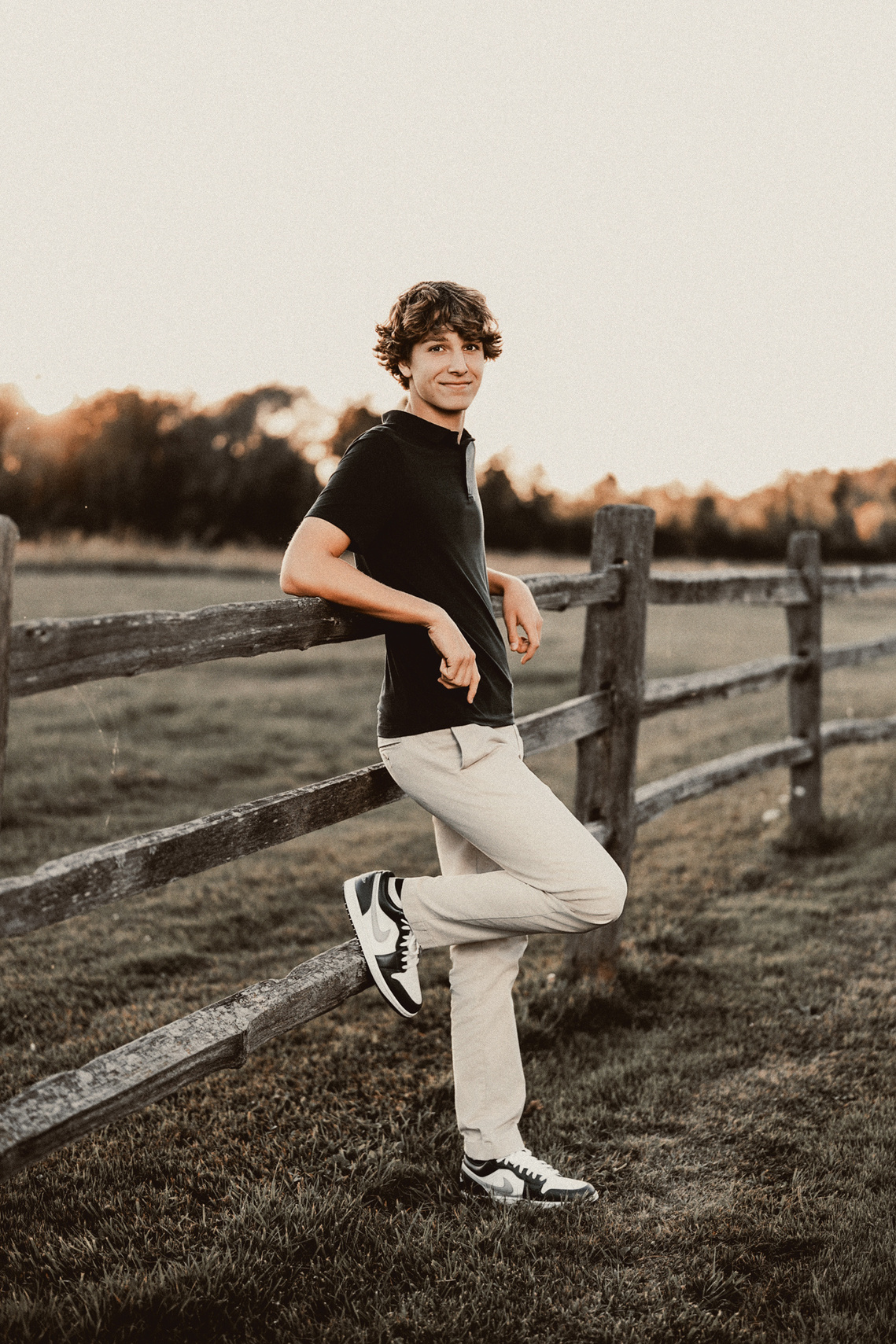 Elegant outdoor senior portrait of a young man from Mequon, Wisconsin. 