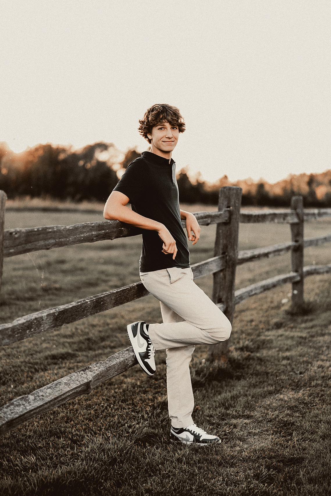 Elegant outdoor senior portrait of a young man from Mequon, Wisconsin. 