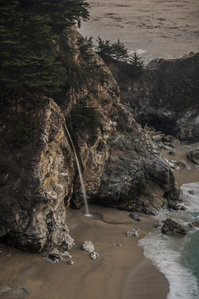 McWay Falls flowing into the Pacific Ocean.