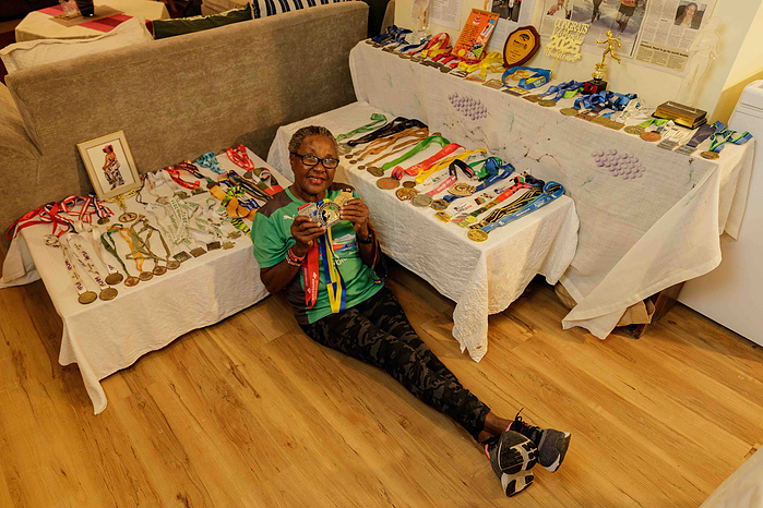 Joyce Nduku. Tata Marathoner at her home in Athi River Nairobi with
her medals