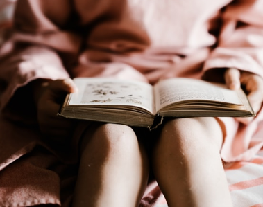 Person enjoying reading time.