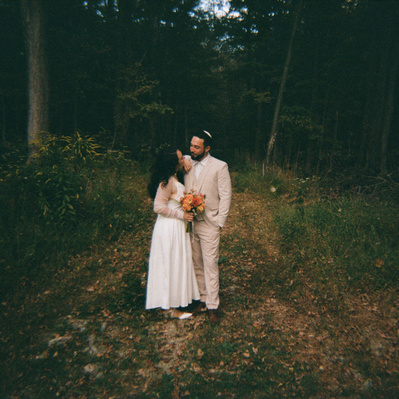 Outdoor wedding in the Hudson Valley captured on 35mm film. Low saturation, with nice contrast.