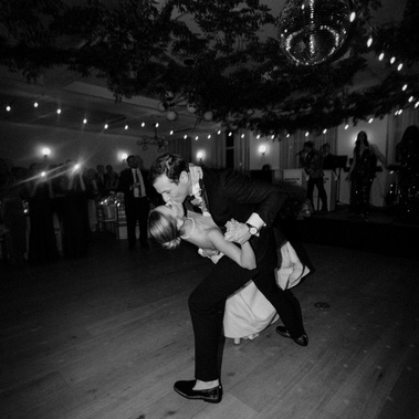 Bride and Groom on the dance floor. Candid moment during NYC wedding reception