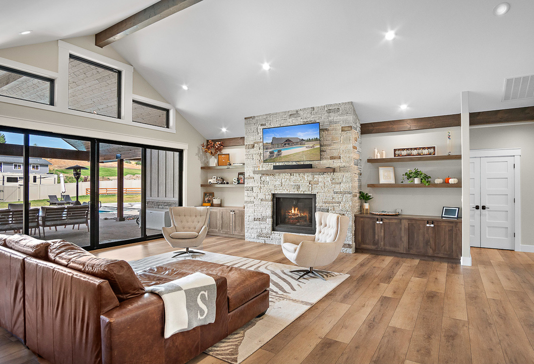 Interior of luxury home in Wenatchee, Washington, real estate, listing, photography, image, wood floor, fireplace, stone, pool, upscale, house, designer, stage, white, amenities, photographer, pic