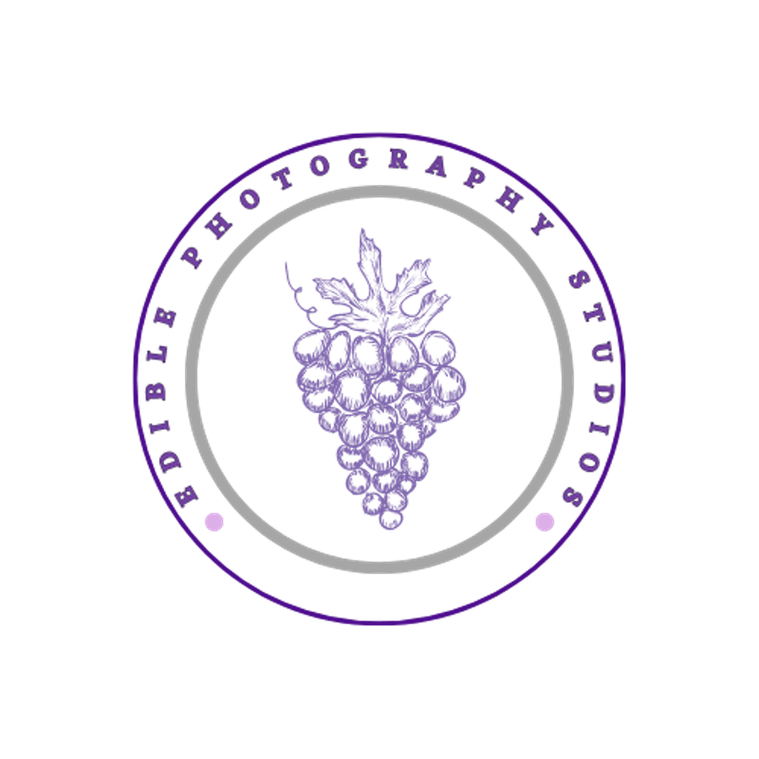 Edible Photography Studios Logo in purple with illustrated, drawn concord grapes