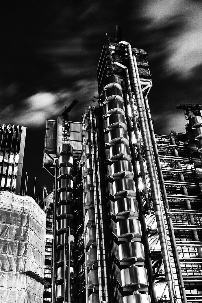 A long exposure black and white photo of Lloyds of London at night by Mark Burley