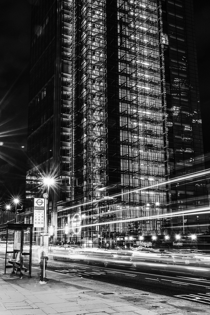 A long exposure black and white photo of Bishopsgate at night by Mark Burley