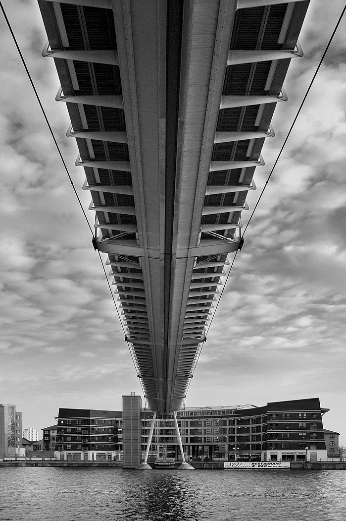 A black and white photo of Excel Bridge by Mark Burley