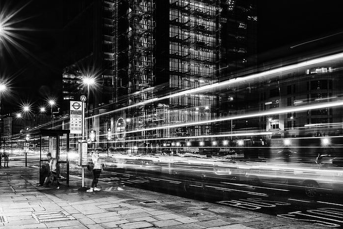 A long exposure black and white photo of Bishopsgate at night with light trails by Mark Burley