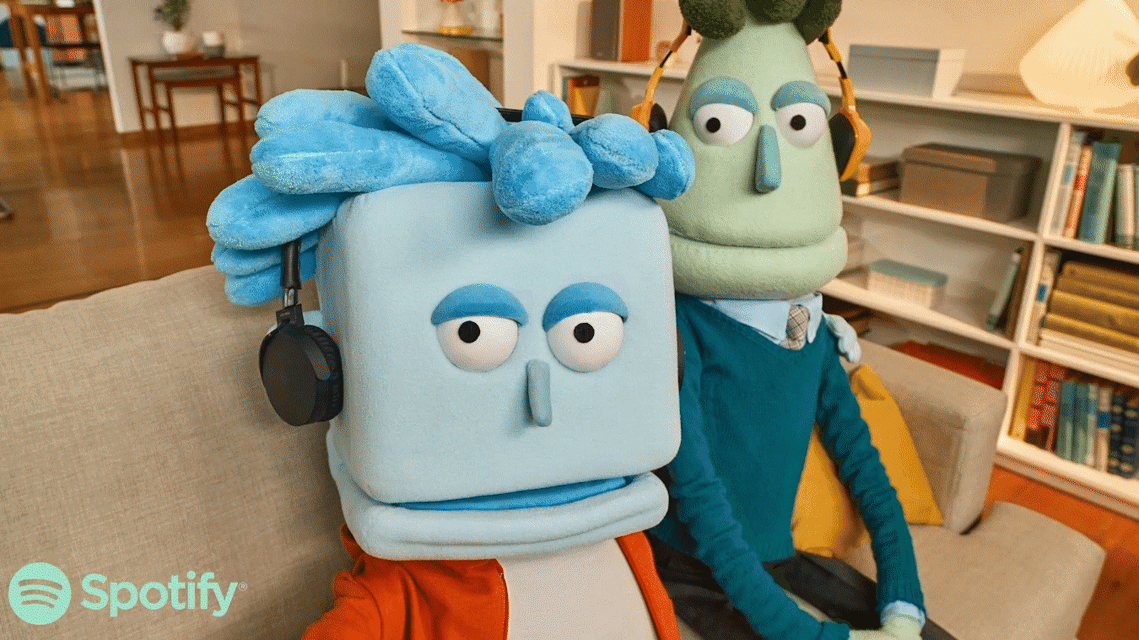 Spotify Duo ad from the global campaign. Two Puppets sitting together listening music in their living room