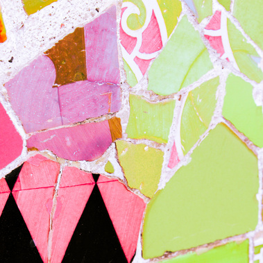 Abstract close-up detail of broken up pink, white and green geometric-shaped tile work at Park Guell in Barcelona by the famed architect Antoni Gaudi color photo fine art print 